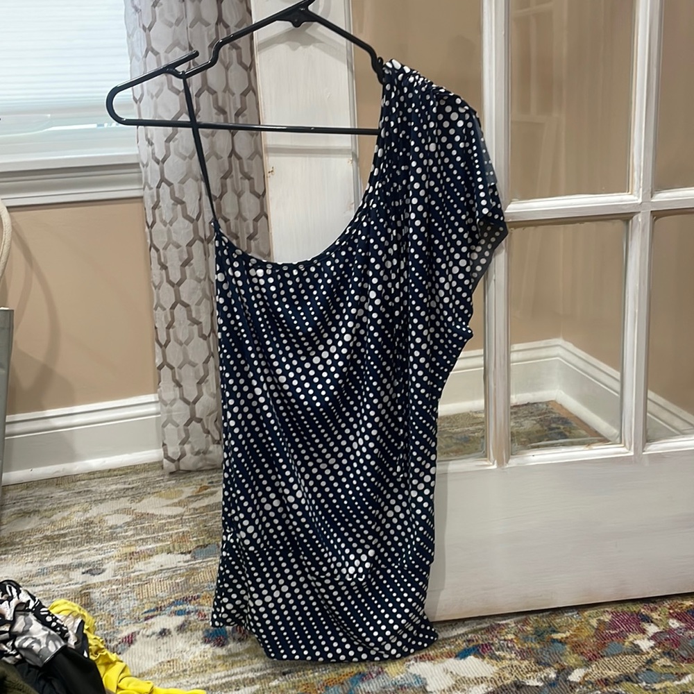 Navy blue with white polka dots size small from urban behavior.